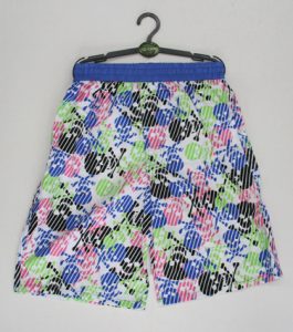 boys skull print shorts, in blue, pink and green. with an elasticated waist